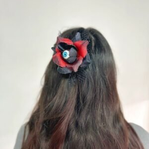 HEBILLA PARA  PELO ROSA CON TELA  ENCAJE Y OJO EN BLISTER
